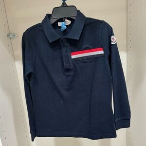 Moncler shirt for boys. Size 6Y and color is navy.